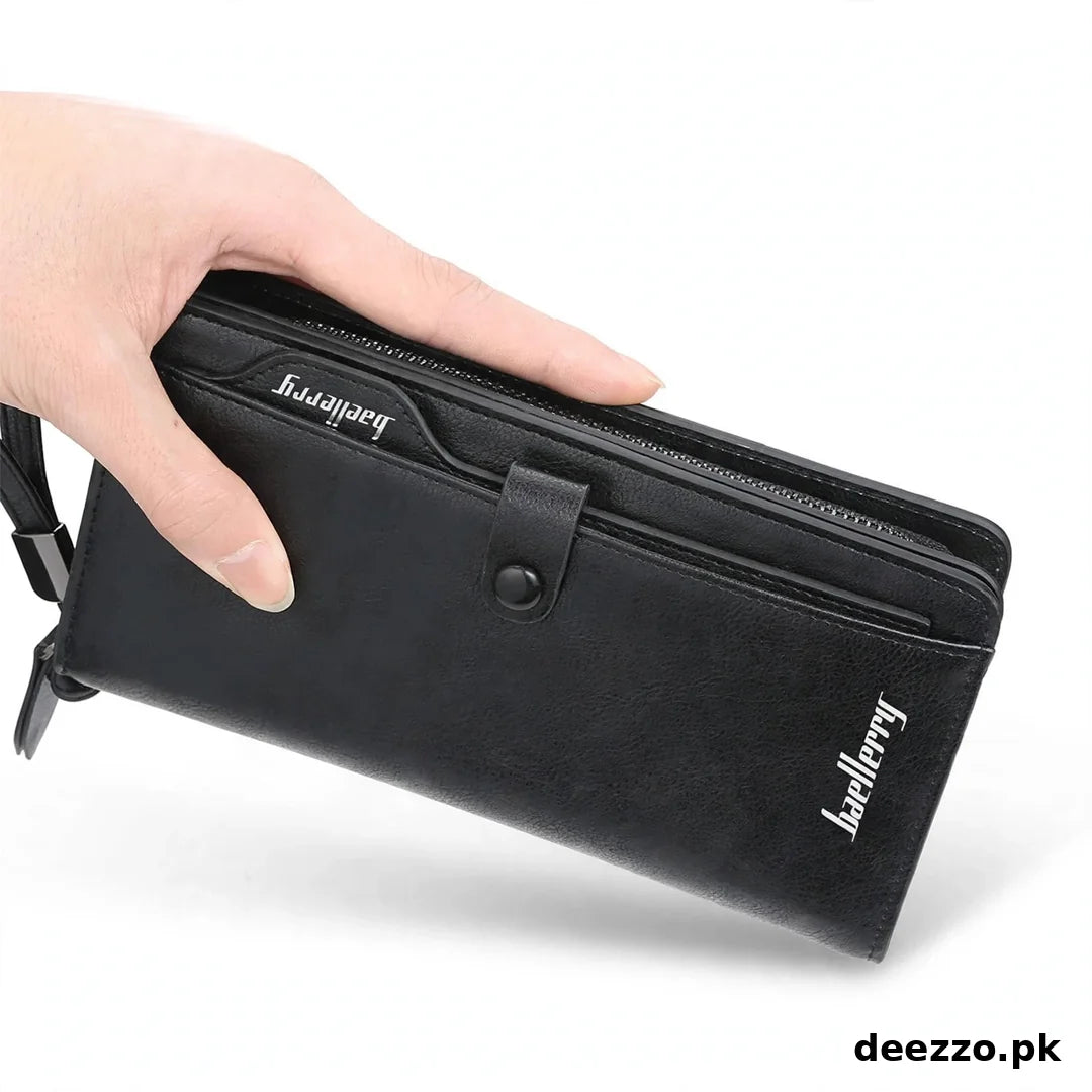 A hand holding a long black leather wallet with a zipper, card slots, and a small strap closure. The brand name 'Lefthappy' is printed in white on the front, and 'deezzo.